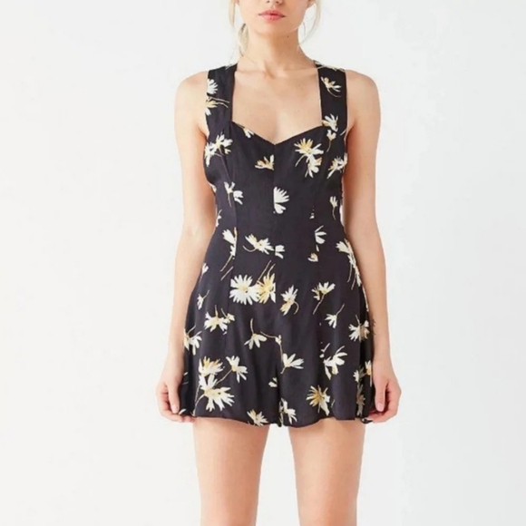 Urban Outfitters Pants - Urban Outfitters black Motif flower romper